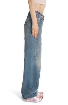 Raw hems and a faded, vintage-inspired wash lend a had-'em-forever vibe to these wide-leg jeans crafted in a seam-detailed pieced design from nonstretch denim. 34" inseam; 23" leg opening; 11 1/4" front rise; 16" back rise (size 28) Zip fly with button closure Front scoop pockets; back patch pockets 100% cotton Dry clean or machine wash, line dry Made in Italy Designer Clothing Jean Crafts, Fit Inspo, Fitness Inspo, Medium Blue, Wide Leg Jeans, Leg Jeans, Givenchy, Designer Clothing, Vintage Inspired