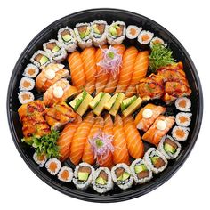 sushi platter with various types of sushi on it