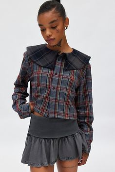 Vintage flannel reworked into an updated shirt by Urban Renewal. Boxy & cropped flannel shirt featuring an oversized, contrast peter pan collar for a one-of-a-kind look. Each one is unique and will vary in color and pattern from what is pictured. Features Urban Renewal Remade peter pan collar flannel shirt Upcycled flannel shirt Oversized collared neckline Relaxed fit Cropped length Button closure Made using upcycled materials Each one is unique Content + Care Cotton Machine wash Made in the USA Cropped Flannel, Upcycled Flannel, Vintage Flannel, Upcycled Materials, Urban Renewal, Autumn Sales, Pan Collar, Peter Pan Collar, Flannel Shirt