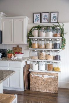 an organized pantry with jars and spices