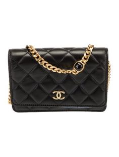 Chanel Crossbody BagBy Virginie ViardBlack LambskinInterlocking CC Logo, Faux Pearl Accents, Quilted Pattern & Chain-Link AccentGold-Tone HardwareChain-Link Shoulder StrapChain-Link Accents & Single Exterior PocketGrosgrain Lining & Dual Interior Pockets with Card SlotsFlap & Snap Closures at FrontIncludes Box & Dust Bag Channel Purse, Chanel Crossbody, Chanel Pearls, Quilted Pattern, Wallet On Chain, Cc Logo, Cross Body Handbags, Chain Link, Faux Pearl