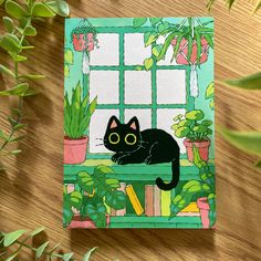 a black cat sitting on top of a wooden table next to potted plants and a window