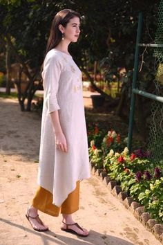 Shop for Linen Bloom Beige Linen Asymmetric Tunic for Women Online at Aza Fashions Fitted Tunic With Asymmetrical Hem For Spring, Fitted Spring Tunic With Asymmetrical Hem, Fitted Asymmetrical Tunic For Spring, Fitted Linen Kurta For Spring, Spring Linen Fitted Kurta, Summer Embroidered Linen Tunic, Linen Tunic Dress With Floral Embroidery, Elegant Straight Kurta Tunic With Floral Embroidery, Embroidered Tunic Summer Cover-up