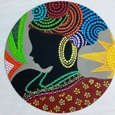 a painting of a woman's head with beads on it and a star in her hair