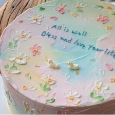 a birthday cake with flowers and birds on it that says all is well, beryl and love your life