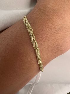 Enjoy the beautiful workmanship of our 14K Solid Foxtail Chain Yellow Gold Braided Bracelet a 7.00" Inch woven beauty with a delicate 3.5mm width, blending delicacy and sophistication. Made from real 14K yellow gold, the foxtail chain design, known for its intricate pattern and strength, features a braided design for added charm. Products Specification: -------------------------------- * Materials: 14K Gold * Stamped 14K Gold ((Stamped 14K for Authenticity) * Finish: Polished * Closure: Lobster claw * Chain style: Braided Weaved Bracelet * Bracelet Width: 3.5mm * Bracelet Length: 7.00" Inch * Condition: Brand New Processing Time: ------------------------ Our standard turnaround time is approximately 2 - 4 business days, subject to change during peak seasons. For the most up-to-date process Chain Braid, Great Gifts For Women, Braided Bracelet, Woven Bracelets, Yellow Gold Chain, Elegant Accessories, Braided Bracelets, Selling On Ebay, Chain Link Bracelet