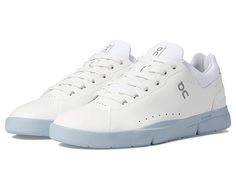 On The Roger Advantage - Men's Shoes : White/Chambray : The third tennis-inspired sneaker to join the On collection co-created with Roger Federer . With its clean lines and minimal stitching, the On The Roger Advantage sneaker demands to be added to your style rotation. Designed to add a stylish contemporary finish to any ensemble. Engineered for long-lasting cushion and comfort. Approved by the Swiss-Maestro himself. A refreshing aesthetic with athletic accents makes The Roger Advantage that es Spring Functional Sneakers With Boost Midsole, Modern Spring Running Sneakers, White Slip-on Sneakers With Abzorb Midsole For Running, Spring Running Shoes With Abzorb Midsole And White Sole, Running Shoes With Abzorb Midsole For Spring, White High-top Walking Shoes For Athleisure, White Functional Sneakers For Spring, Mid-top Athleisure Skate Shoes With White Sole, Spring Low-top Running Shoes With Abzorb Midsole