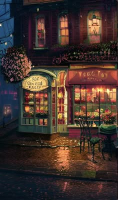 a painting of a restaurant at night with lights on and flowers in the window boxes