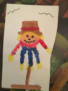 a child's drawing of a scarecrow