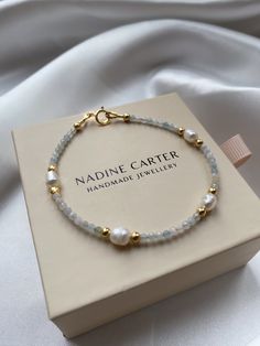 This gorgeous dainty bracelet is made from Grade A, Freshwater Pearls with 22k gold vermeil beads and natural semi precious black spinal beaded gemstones. Perfect for bridal jewellery or a bridesmaid gift, everyday wear or even stacking with other gemstone bracelets. Gold Vermeil: I use gold vermeil for the beads, extension chain and clasp. Gold vermeil is a type of gold jewellery made to last. The base metal is Sterling Silver which means your piece is made from precious metals only. A thick la Dainty Yellow Gold Bracelets With Gemstone Beads, Gold Bracelet With Natural Stones For Wedding, Dainty Yellow Gold Bracelet With Gemstone Beads, Gold Beaded Gemstone Bracelets For Wedding, Gold Gemstone Beaded Bracelets For Wedding, Dainty Gold Beaded Bracelet With Natural Stones, Delicate Gold Beaded Bracelets With Gemstones, Gold Gemstone Beads Bracelet For Wedding, Gold Wedding Bracelets With Gemstone Beads