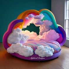 a rainbow couch with clouds on it in front of a window