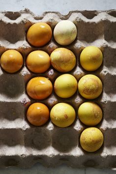 an egg carton filled with different types of eggs