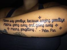 a woman with a tattoo on her arm that reads, never say goodbye because being poopy