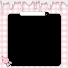 a pink and white checkered table cloth with an empty black board on the bottom