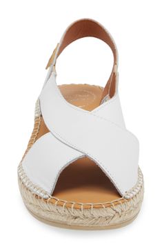 An espadrille-inspired sole enhances the earthy, vintage style of an open-toe sandal featuring smooth leather straps. Leather upper and lining/rubber sole Made in Spain Summer Open Toe Espadrilles With Textured Sole, Summer Leather Sandals With Textured Sole, Vacation Espadrilles With Removable Insole And Open Heel, Espadrilles With Leather Sole For Vacation, Natural Color Open Toe Wedge Sandals With Textured Sole, Natural Open Toe Wedge Sandals With Textured Sole, Summer Leather Espadrilles With Cushioned Footbed, Vacation Slingback Sandals With Cork-bed Midsoles And Round Toe, Beach Slingback Sandals With Woven Sole