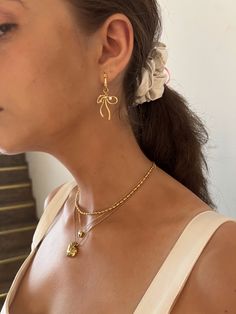 Elevate your everyday look with these stunning ribbon element earrings, designed with intention and care. Wishlist Board, En Route Jewelry, Stacking Jewelry, White Gemstones, Stylish Earrings, Heart Hair, Stylish Earring, Stacked Jewelry, Bow Earrings