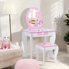 With the clear mirror, this kids vanity table and stool set with cute patterns is a fun and functional addition to your child's bedroom or play area. And you can remove the top if your kids need to concentrate on drawing or writing. After finishing make up or study, there is a practical drawer which comes with ample space to store items to keep the tabletop tidy and clean. Considering your kids' safety, this high quality vanity set is equipped with round edge design and anti-toppling device. In Toddler Vanity, Mirror Drawer, Kids Vanity Set, Large Oval Mirror, Girls Vanity, Mirror Drawers, Bedroom Makeup Vanity, Makeup Dressing Table, Clear Mirror