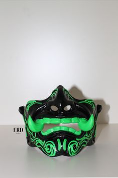 Glow in the dark mask. The stripes and teeth on the mask are painted with Fluorescent Paint. Dazzle at the party with this mask. #lightmask #shinemask #glowinthedarkmask #festivalclothing #fathersday #birthdaygiftforboy #neonmask #ledmask #dayofthedead #cyberpunkmask #masquerademask #techwearmask #3dprintedmask #halfmask #japanesemask #demonmask Masquarade Mask, Dark Dragon, Dragon Mask, Light Mask