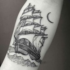 a black and white photo of a ship on the arm