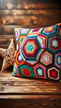 A vivid, high-definition image of a colorful crocheted pillow with hexagonal patterns, set against a wicker star, on a wooden surface with a wooden ba Crochet Cushion Pattern, Cushion Tutorial, Crochet Cushion, Crochet Cushion Cover, Crochet Hexagon, Crochet Inspo, Your Crochet, Crochet Cushions