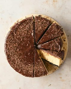 a chocolate cake with one slice missing from it