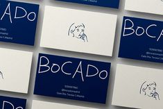 several business cards with handwritten font on them, all in blue and white colors