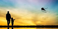 Father and son with kite at sunset Forms Of Communication