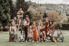 a group of children and adults posing for a photo