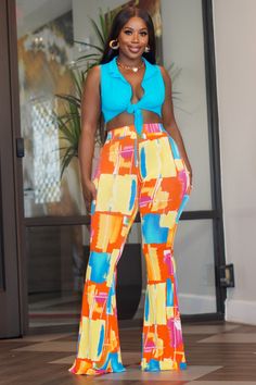 Two piece set, Crop top, Collar, V neck, Sleeveless, Self-tie closure, High waisted pants, Elastic waistband, Wide legs, The model is wearing a medium 70s Outfits Black Women, Kente Dress, Street Outfits, Creative Kitchen, 70s Outfits, Fancy Pants, Street Outfit, Cadillac Escalade, Wide Legs