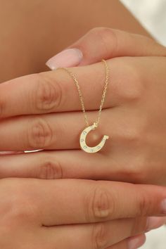 14k 18k Gold Diamond Horseshoe Charm Necklace, Dainty Lucky Horse Shoe Necklace, Good Luck Horse Western Necklace, Horseshoe Jewelry Horseshoes have become known as a symbol of protection and to give good luck. FEATURES * Solid Gold (real gold, not gold plated or gold filled material) * Gold Karat: 10K (417) - 14K (585) - 18K (750) (optional) * Pendant Height: 0.56 Inches (1.42 cm) * Pendant Width: 0.54 Inches (1.38 cm) * Available Gold Color: Yellow gold, rose gold and white gold (optional) * D Elegant Gold Horseshoe Jewelry, Gold Horseshoe Jewelry For Anniversary, Elegant Gold Horseshoe Necklace, Formal Yellow Gold Horseshoe Jewelry, Gold Horseshoe Necklace For Gift, Horseshoe-shaped Yellow Gold Jewelry Gift, Horseshoe Shaped Yellow Gold Jewelry Gift, Yellow Gold Horseshoe Necklace Gift, Gold Horseshoe Necklace For Formal Occasions