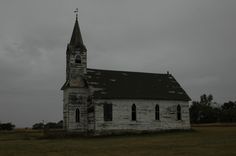 an old church sits in the middle of nowhere