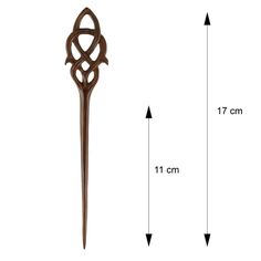 a long wooden stick with an intricate design on it's end and measurements for the length