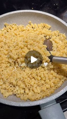 a frying pan filled with macaroni and cheese