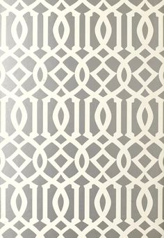 a gray and white wallpaper with an intricate design on it's side,