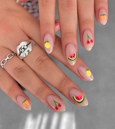 These nails feature a delightful summer design with vibrant fruit motifs, including cherries, lemons, peaches, and watermelons, on a nude base. Perfect for adding a splash of color to your summer style.  🌸Click on the image to shop our trending Korean Gel Polish this season.  🌸Credit: peachinails on Instagram 🌸Summer nails, simple summer nails, fruity nail designs, Korean gel polish, watermelon nail art, cherry nail designs, lemon nail art, peach nail designs, vibrant summer nails, nude base nails, trendy nail art, colorful summer nails, fruit-themed nails, Instagram nail art. Watermelon Nail Art, Fruit Nail Designs, Lemon Nails, Fruit Designs, Fruit Nail Art, Watermelon Nails, Peach Nails, Cherry Nails, Cute Summer Nails