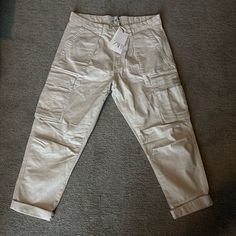 Cargo Pants In Off-White Color Nwt Never Worn Brand New Condition. Non-Smoking, No Pets. White Mid-rise Cargo Pants With Side Pockets, White Mid-rise Casual Cargo Jeans, Casual White Mid-rise Cargo Jeans, White Cargo Pocket Trousers, White Cargo Bottoms, Cream Straight Leg Cargo Pants With Patch Pockets, Mid-rise White Cargo Pants, White Mid-rise Cargo Pants, White Mid-rise Cargo Jeans