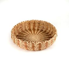 a woven basket is shown on a white background