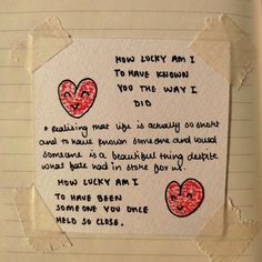 a piece of paper with writing on it and two hearts drawn on the inside of it