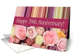 an anniversary card with flowers on it