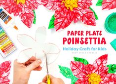 the paper plate poinsettia is being made with crayons and glue