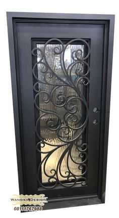 an iron door with glass on the front and side doors are shown in black color