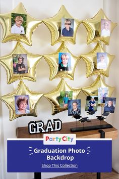 graduation party photo backdrop with gold foil stars and photos on the back drop off table