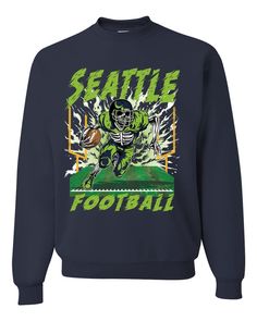 Seattle SEA American Football Flaming Skeleton | Trendy Streetwear Fantasy Fan Sports Unisex Crewneck Sweatshirt   Pick a sport, any sport we've got you covered. From Football and Baseball to Table tennis and Horseback Riding whatever your passion we have a cool design for you to wear while to showing off your skills   * TOP QUALITY: Our shirts are made with a soft, pre-shrunk 50/50 cotton/polyester blend, ensuring maximum comfort and durability. We also use the newest, high-tech printing techniques available, guaranteeing the finest print on the market.   * EASY CARE: Care for your t-shirts with ease, simply machine wash inside-out, cold with like colors. No complicated care instructions needed!    * SIZES AVAILABLE: Our t-shirts are designed to fit just about everyone, (S-5X) and our uni Green Graphic Print Crew Neck Activewear, Green Crew Neck Sweatshirt For Gym, Sporty Sweatshirt With Team Logo For Sports, Sporty Sweatshirt With Team Logo, Sporty Sweatshirt With Graphic Print For Sports, Team Spirit Moisture-wicking Sweatshirt For Sports Events, Sporty Graphic Print Sweatshirt For Sports, Football Season Sweatshirt With Team Logo, Crew Neck Sweatshirt With Team Logo For Sports