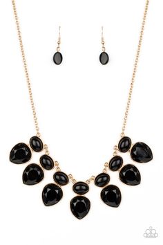 Featuring sleek gold fittings, rows of faceted black teardrop beads attach to the bottoms of polished black oval beads, creating a dangerously bold fringe below the collar. Features an adjustable clasp closure. Sold as one individual necklace. Includes one pair of matching earrings. Modern Masquerade, Black Jewelry Necklace, Hanging Necklaces, Oval Beads, Teardrop Beads, Modern Necklaces, Paparazzi Accessories, Black Necklace, Black Earrings