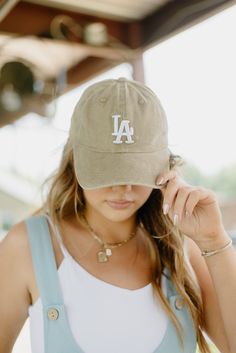 Experience the ultimate blend of comfort and style with the New LA Embroidered Trucker Hat. Designed specifically for women, this accessory embodies our brand's commitment to quality and affordability. Ideal for adding a stylish touch to your everyday outfits. Sneaker Heels Wedges, Boutique Trends, Dress Jewelry, Romper Dress, New Tops, Sneaker Heels, Long Sweaters, Accessories Bracelets, Bottoms Pants