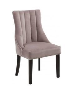 the side view of a dining chair with an upholstered back and wooden legs