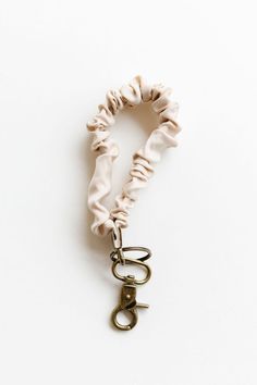 The best keychain you've ever had is here - so pretty!! This is made from luxe fabric, durable and silky smooth, and comes in a creamy oat milk color! It's the perfect fabric for everyday wear and we are obsessed. Scrunchie Keychain, Groovy Colors, Modest Girls Dresses, Milk Color, Sliced Bread, Hobbies To Try, Modest Clothing, Trendy Chic, Oat Milk