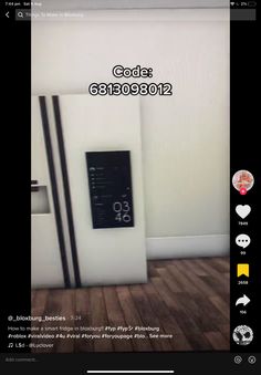 a white refrigerator freezer sitting inside of a kitchen next to a wall mounted clock