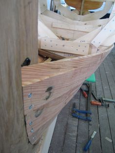 a wooden boat is being built and ready to be used as a crafting project