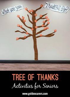 there is a tree that has been made out of paper and some writing on it